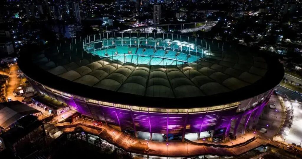 Arena Fonte Nova ilumina-se de lilás em apoio ao teste do pezinho